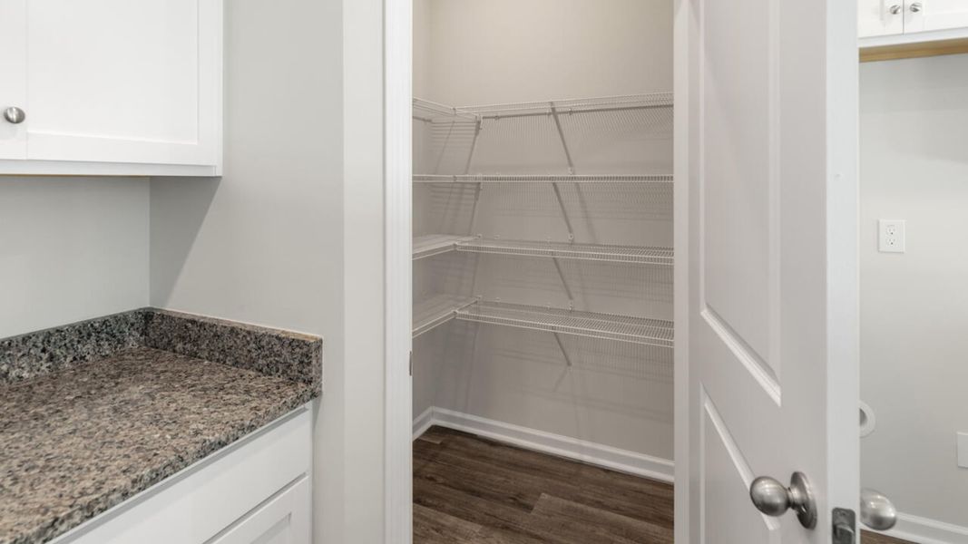 Furnished interior view inside a new home in Indigo Preserve, Leland (Image 9).