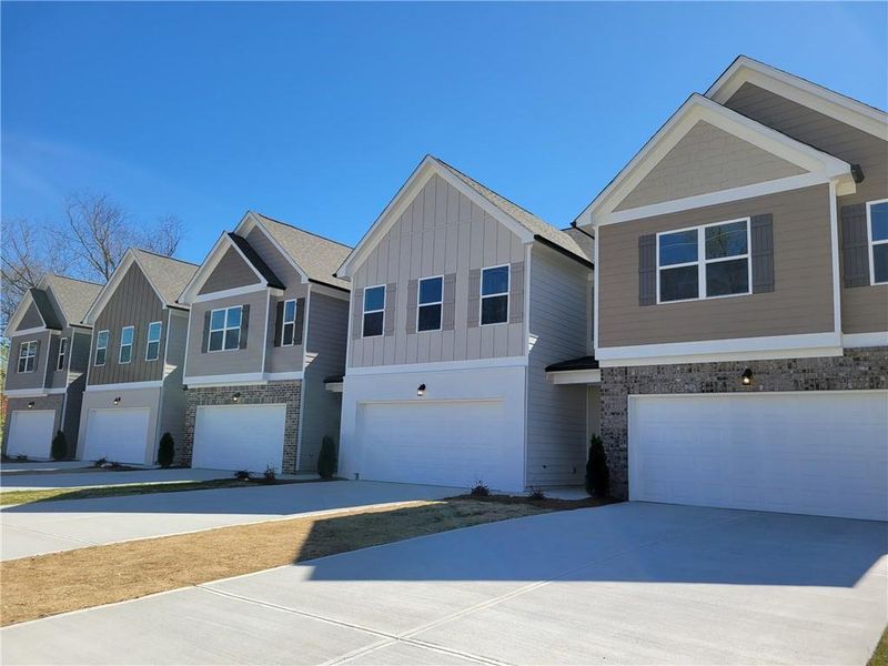 Front exterior of a new home in , Winder, GA, highlighting curb appeal (Image 2). Front exterior of a new home in , Winder, GA, highlighting curb appeal (Image 2).