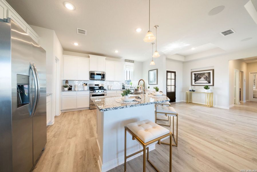 Furnished interior view inside a new home in Alamo Estates, San Antonio (Image 13).