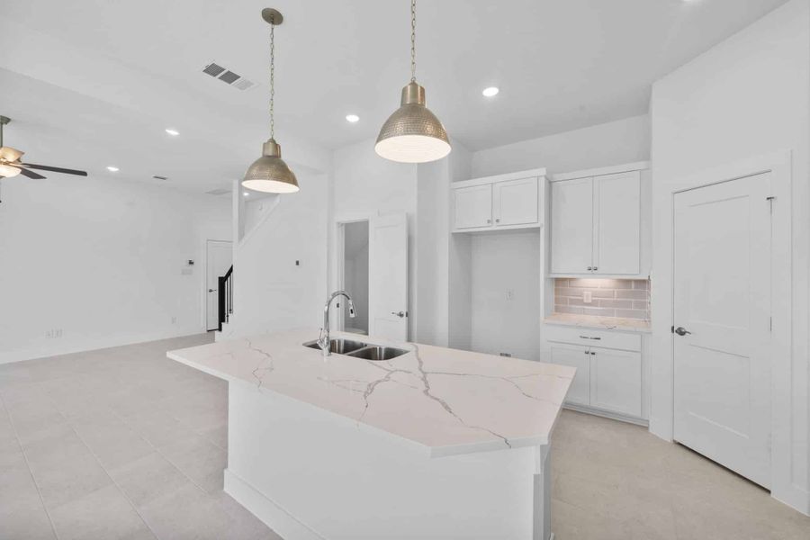 Furnished interior view inside a new home in Bridgeland, Cypress (Image 10).