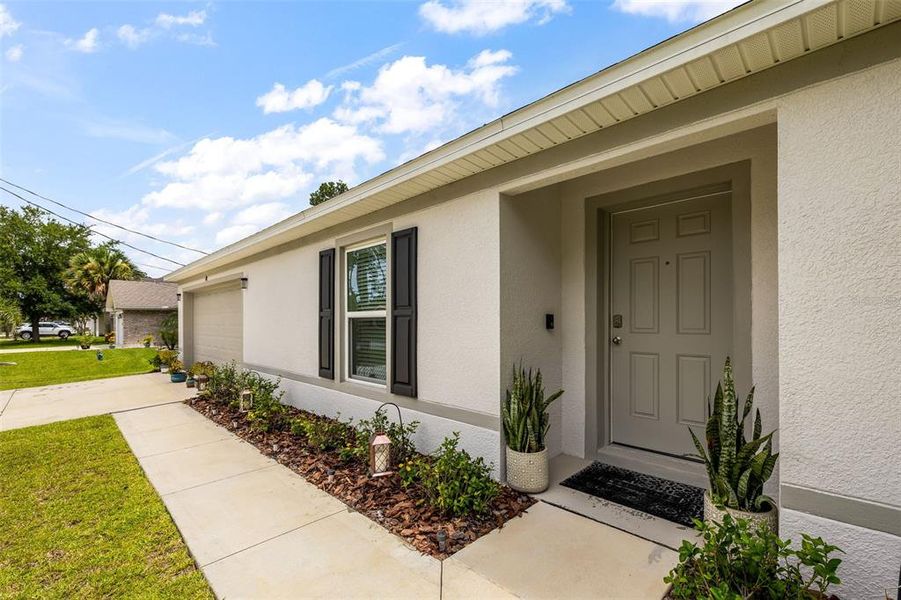 Exterior details and patio area of a home in Palm Coast, Palm Coast (Image 3). Exterior details and patio area of a home in Palm Coast, Palm Coast (Image 3).