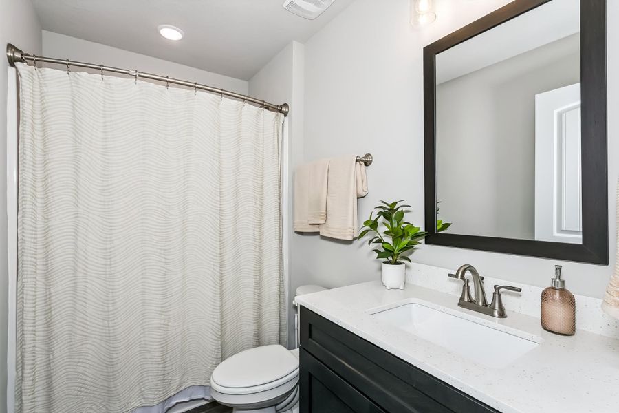 Furnished interior view inside a new home in Buckeyes Landing, Navarre (Image 36).