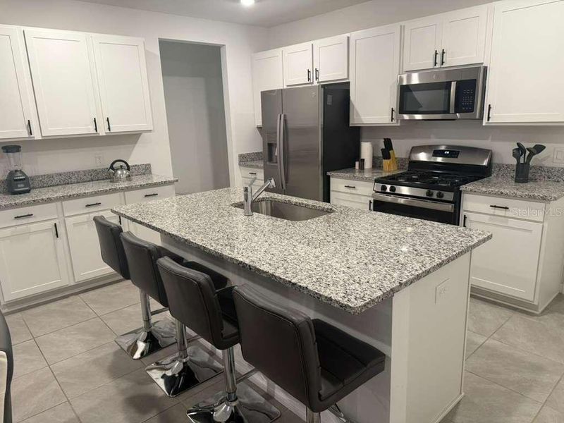 Furnished interior view inside a new home in , Winter Garden (Image 6).