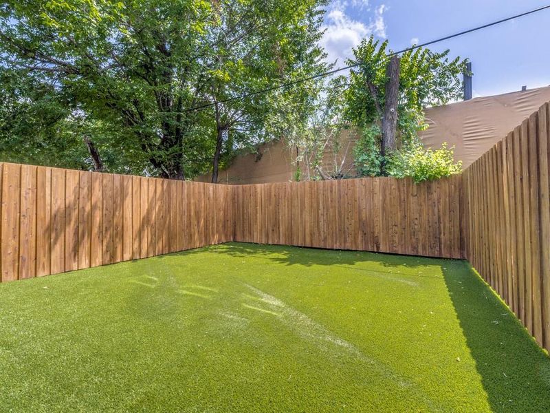 View of fenced backyard
