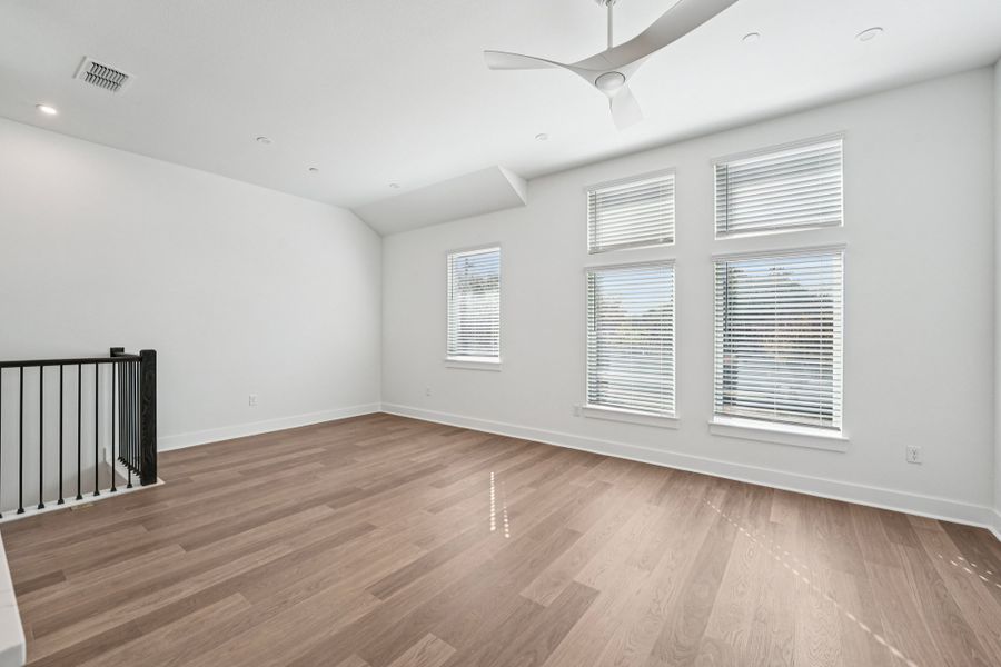 Spacious, unfurnished interior of a new home in Koenig Townhomes, Austin (Image 11).