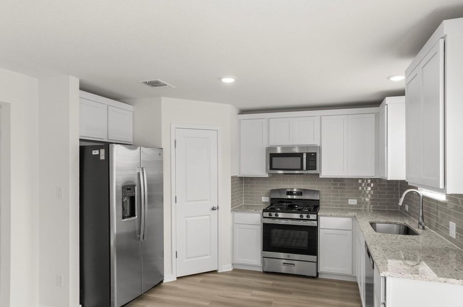 Furnished interior view inside a new home in Blanco Vista, San Marcos (Image 6). Furnished interior view inside a new home in Blanco Vista, San Marcos (Image 6).