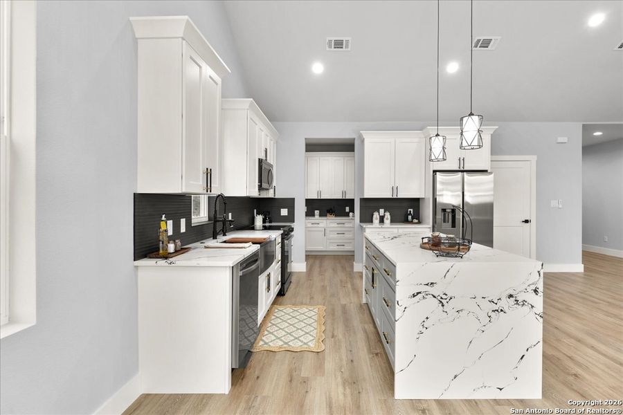 Furnished interior view inside a new home in , Fischer (Image 5).