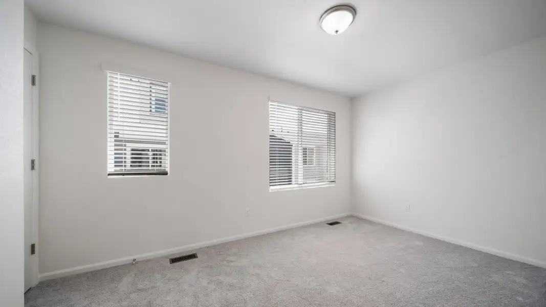 Spacious, unfurnished interior of a new home in Banning Lewis Ranch, Colorado Springs (Image 12).