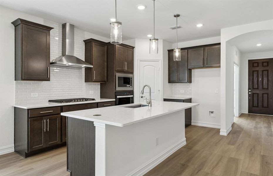 Kitchen with eat in bartop island