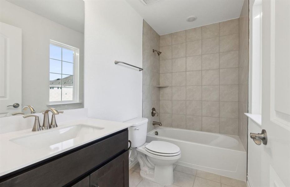 Upgraded secondary bathroom*real home pictured