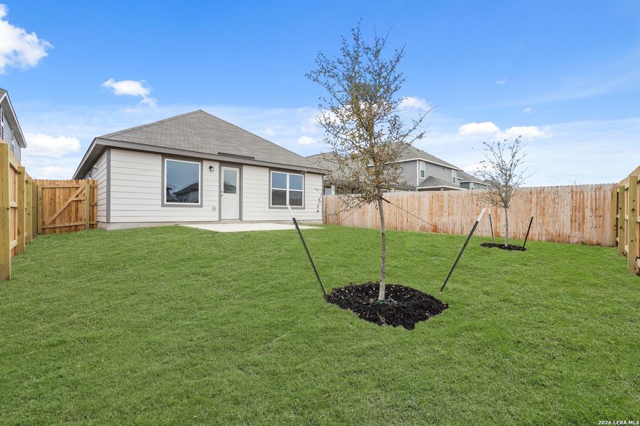 Exterior details and patio area of a home in Abbott Place, St. Hedwig (Image 3).