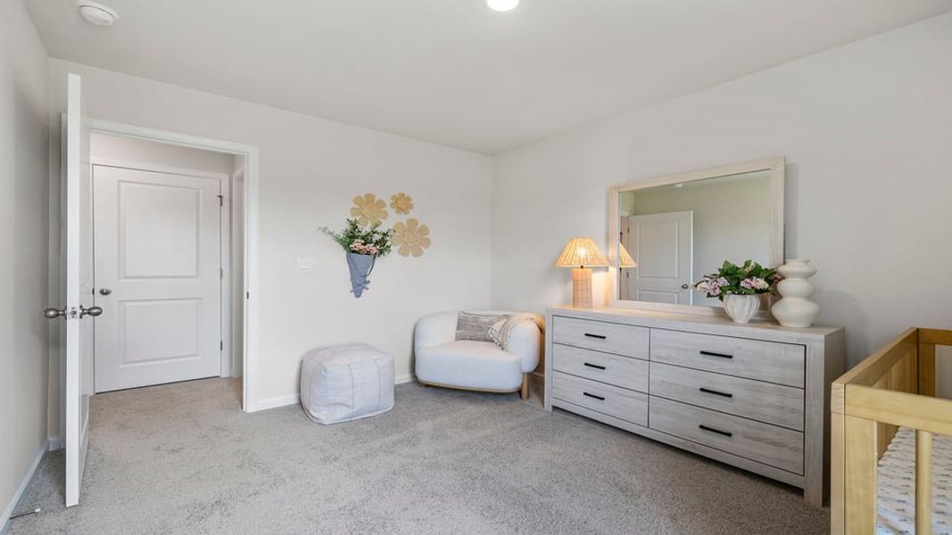 Furnished interior view inside a new home in Lakestone, Woodruff (Image 27).