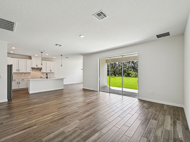 Spacious, unfurnished interior of a new home in Oakfield Trails - Signature Series, Parrish (Image 8).