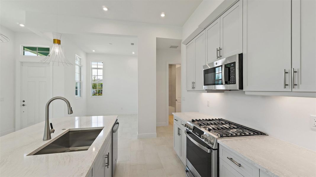 Furnished interior view inside a new home in Rivella, Port St. Lucie (Image 5).