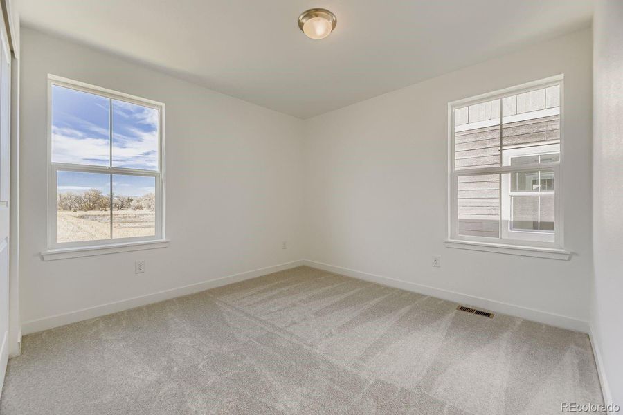 Spacious, unfurnished interior of a new home in Vermilion Creek: The Pioneer Collection, Centennial (Image 9).