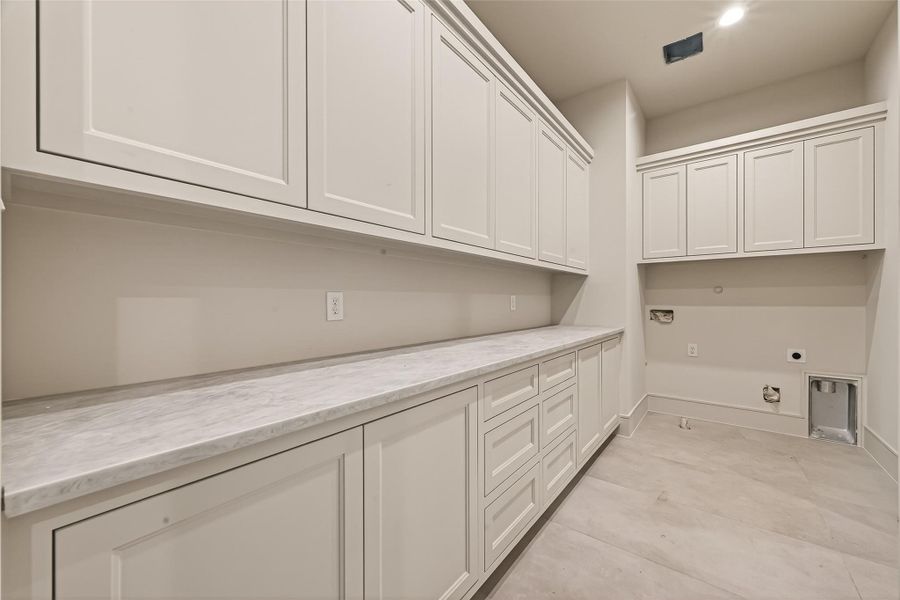 Long utility room with custom carpentry