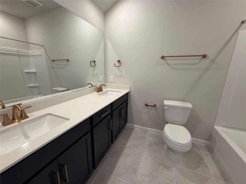 Furnished interior view inside a new home in Cannon Ranch 40s, Dripping Springs (Image 12).