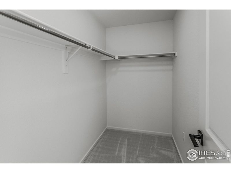 MASTER BEDROOM WALK IN CLOSET