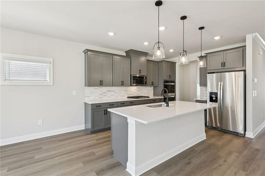 Furnished interior view inside a new home in Vines at Mill Creek - Estate Series, Braselton (Image 8).