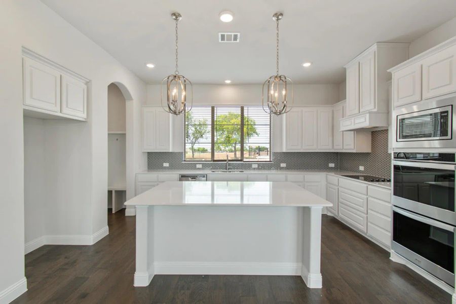 Kitchen | Concept 2797 at Hidden Creek Estates in Van Alstyne, TX by Landsea Homes