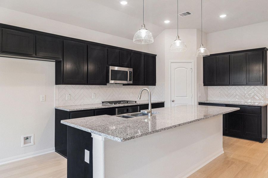 Furnished interior view inside a new home in Deer Pines, Conroe (Image 5).