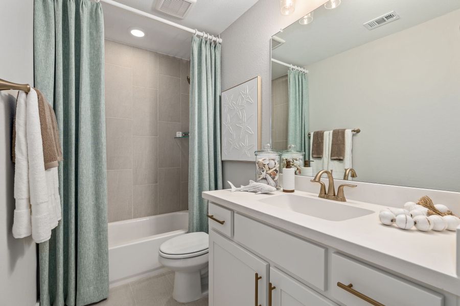 Plan 1640 Secondary Bathroom Representative Photo by American Legend Homes