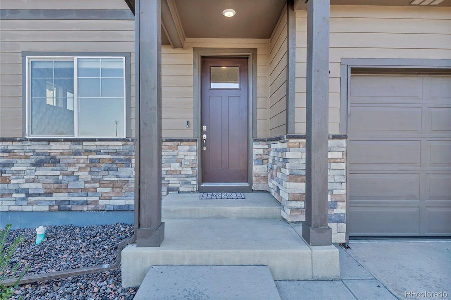 Exterior details and patio area of a home in Brighton Crossing, Brighton (Image 3).