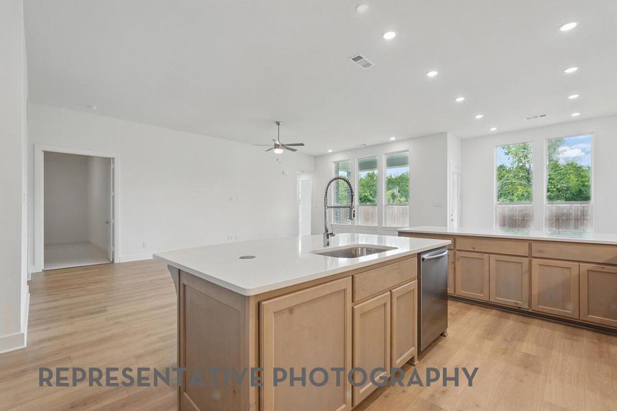 Furnished interior view inside a new home in 6 Creeks at Waterridge, Kyle (Image 4).