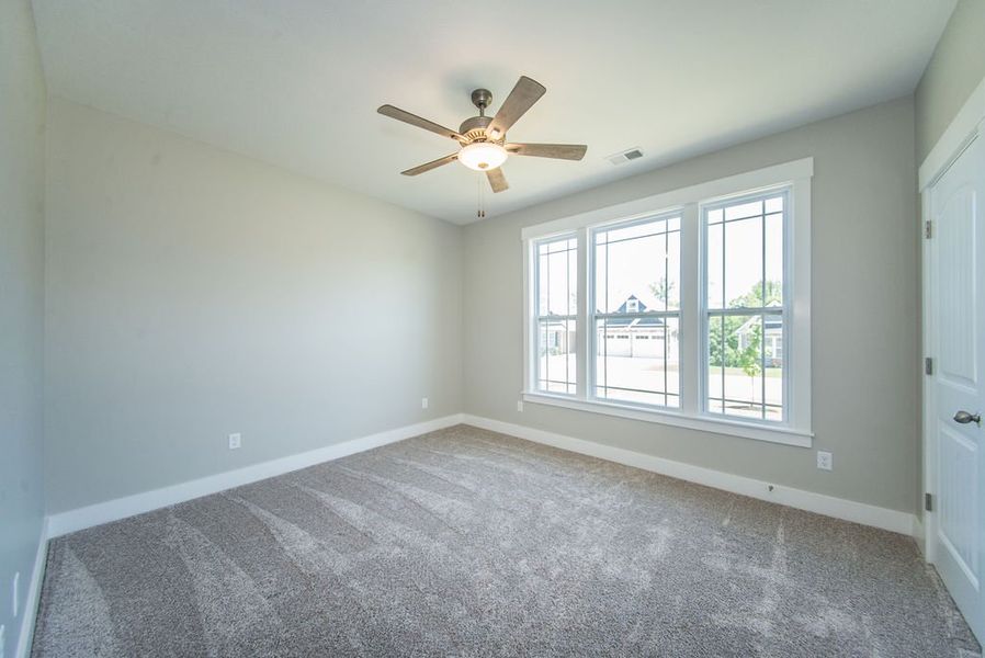 Representative unfurnished interior of a home built from the Beaumont Elite by Enchanted Homes in Pointe Summit, Slater-Marietta (Image 24).