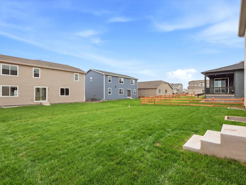 Exterior details and patio area of a home in Poudre Heights: The Alpine Collection, Windsor (Image 3).