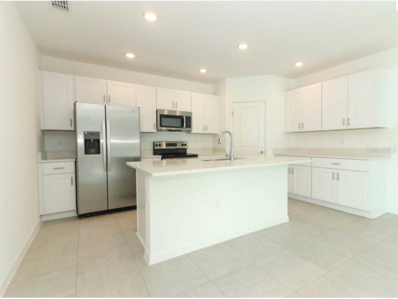 Furnished interior view inside a new home in , Haines City (Image 3).