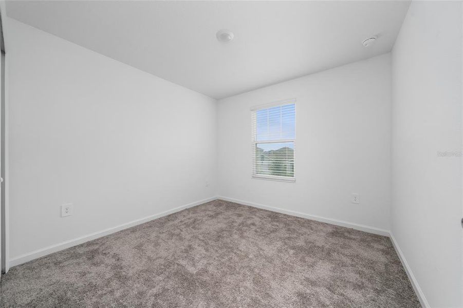 Spacious, unfurnished interior of a new home in Ranches at Lake Mcleod: Legacy Collection, Eagle Lake (Image 10).