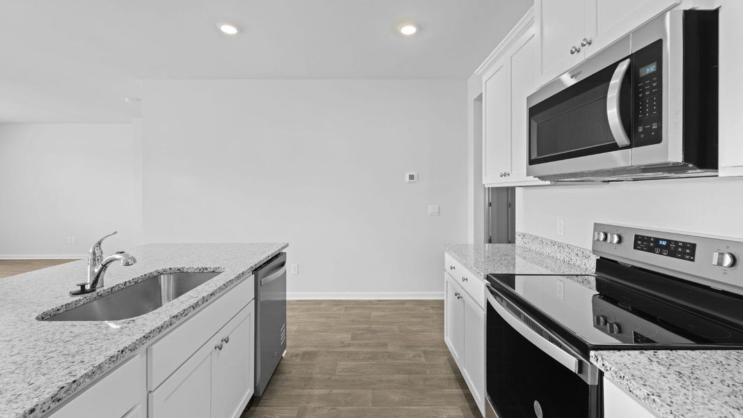 Furnished interior view inside a new home in The Ranch, Holly Hill (Image 8).