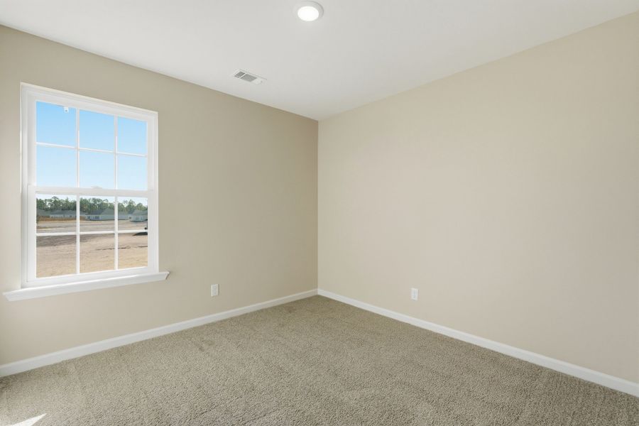Representative unfurnished interior of a home built from the The Chatman by RTS Homes in The Gardens at 15 West, Hinesville (Image 39).