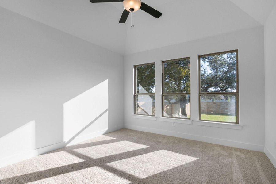 Primary Bedroom with elevated ceiling