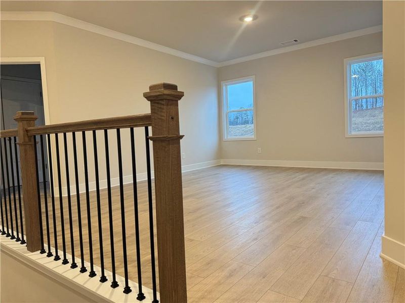 Spacious, unfurnished interior of a new home in Ponderosa Farms Manor, Gainesville (Image 27).