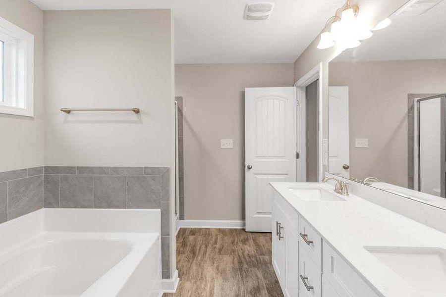 Representative furnished interior of a home built from the Aberdeen by Caviness & Cates Communities in Bartlett Manor, Youngsville (Image 53).