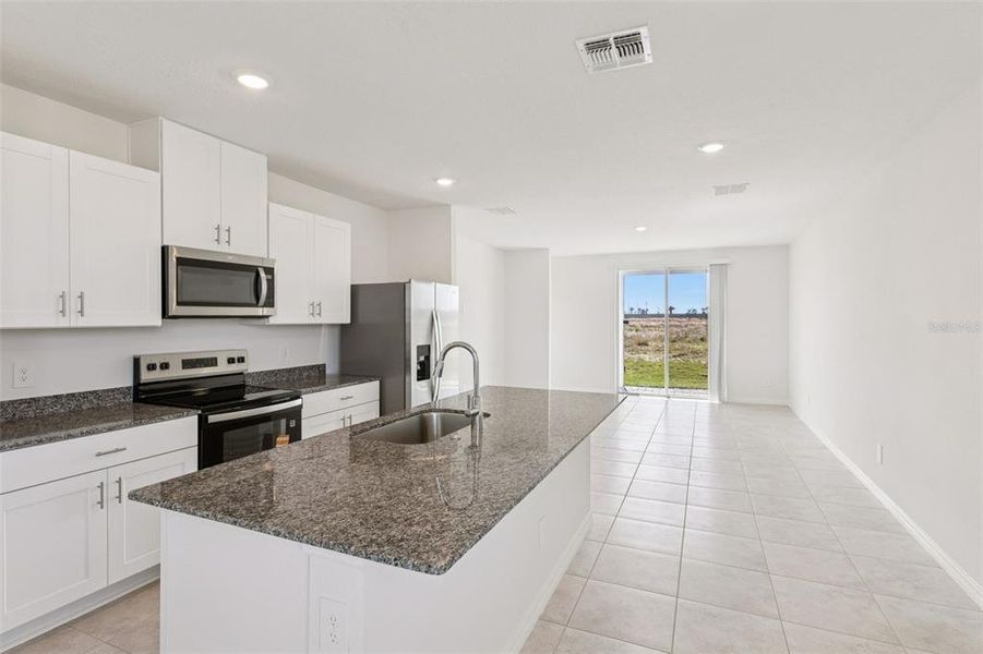 Furnished interior view inside a new home in Crosswinds - Classic Series, Haines City (Image 11).