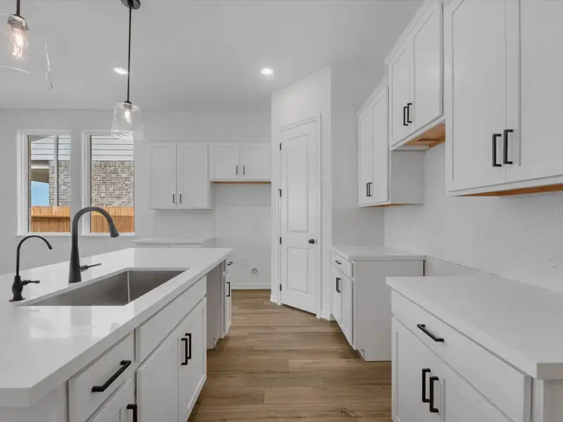 Kitchen. Sample product photo. Actual exterior and interior selections may vary by homesite. Photo may be virtually staged.