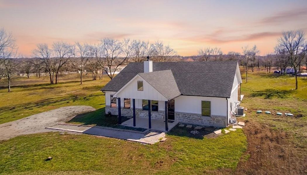 Front exterior of a new home in , Wortham, TX, highlighting curb appeal (Image 21). Front exterior of a new home in , Wortham, TX, highlighting curb appeal (Image 21).