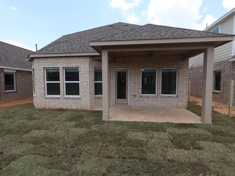 Exterior details and patio area of a home in Marvida, Cypress (Image 3).