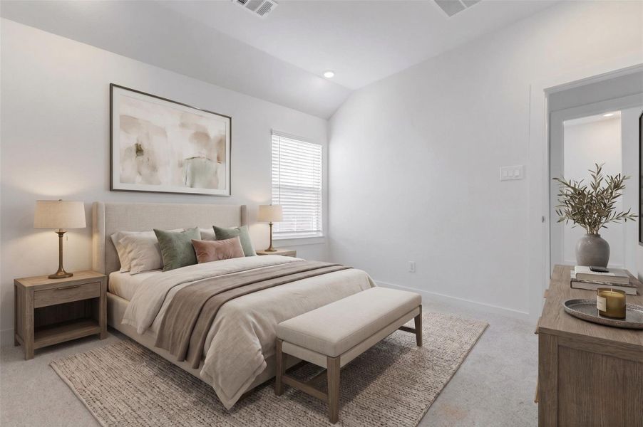 Comfortable secondary bedroom with soft carpet, neutral finishes, recessed lighting, and a window with blinds. The room offers a practical layout with easy hallway access and enough open wall space for a bed, desk, dresser, or customized furniture arrangement.