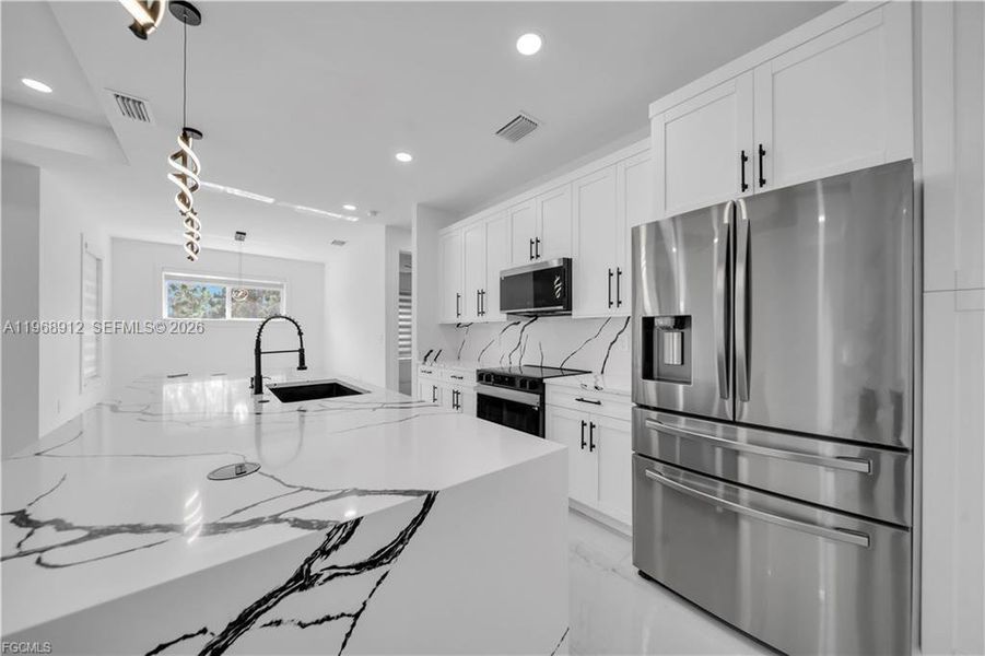 Furnished interior view inside a new home in , Labelle (Image 12).