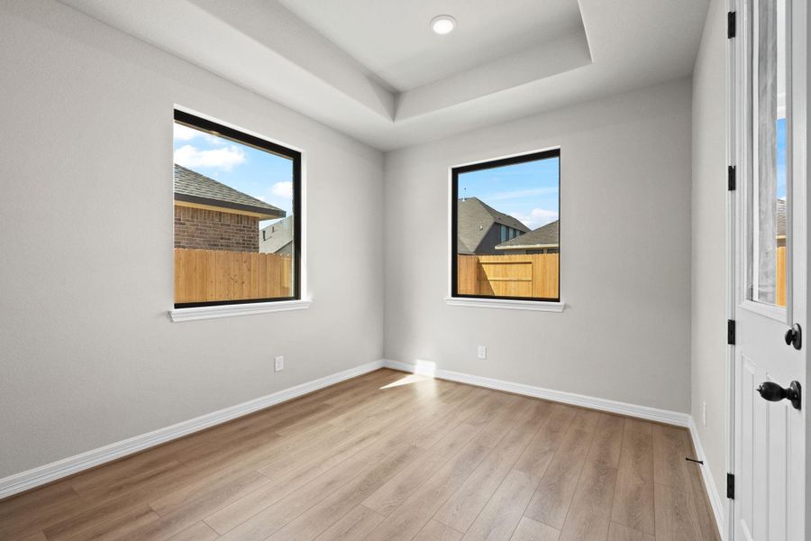 With an abundance of natural light streaming through the windows, the breakfast nook is bathed in a sunny glow, creating the perfect atmosphere to enjoy your morning coffee or a family breakfast.