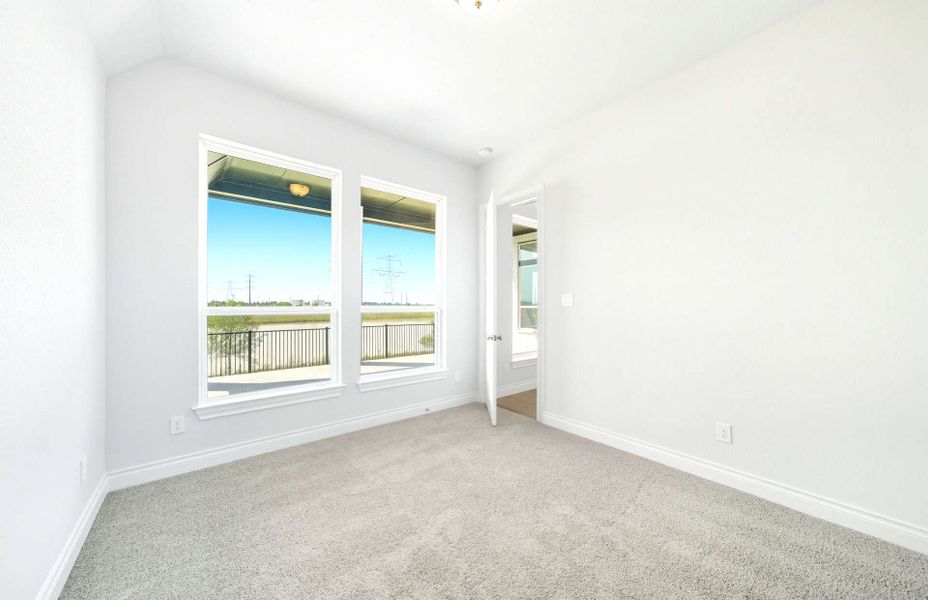 Representative unfurnished interior of a home built from the 3663 by Ravenna Homes in Artavia 70′, Conroe (Image 38).