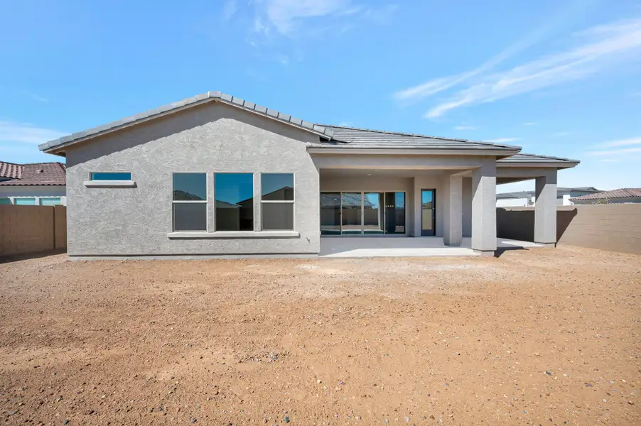 Exterior details and patio area of a home in Sentiero at Windrose, Waddell (Image 3).