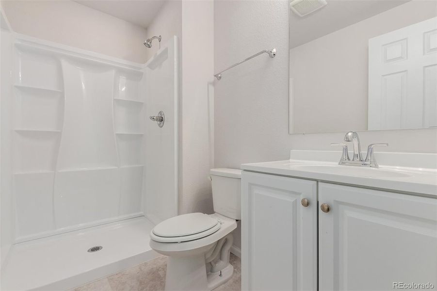 Furnished interior view inside a new home in The Aurora Highlands, Aurora (Image 9).