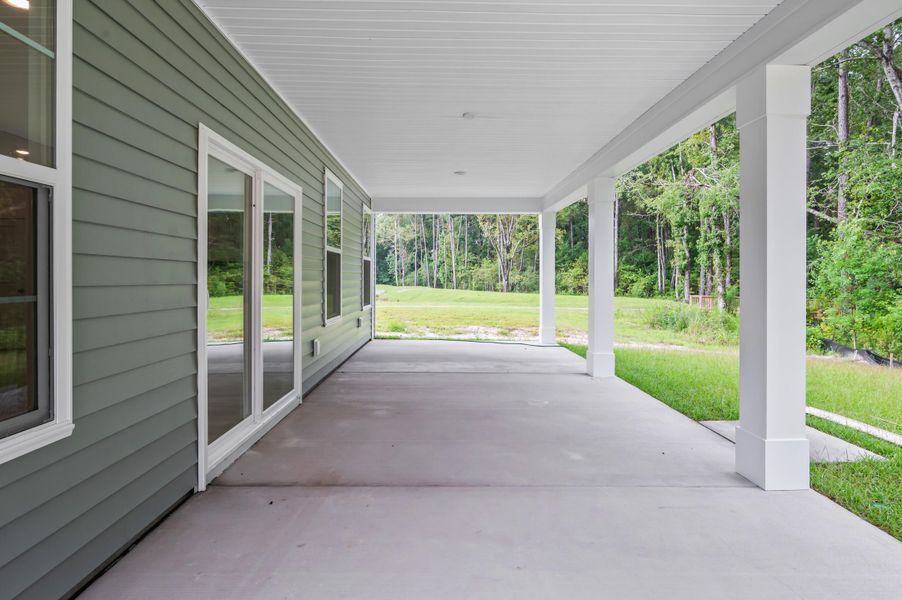 Exterior details and patio area of a home in Creekside at Andrews, Summerville (Image 2). Exterior details and patio area of a home in Creekside at Andrews, Summerville (Image 2).