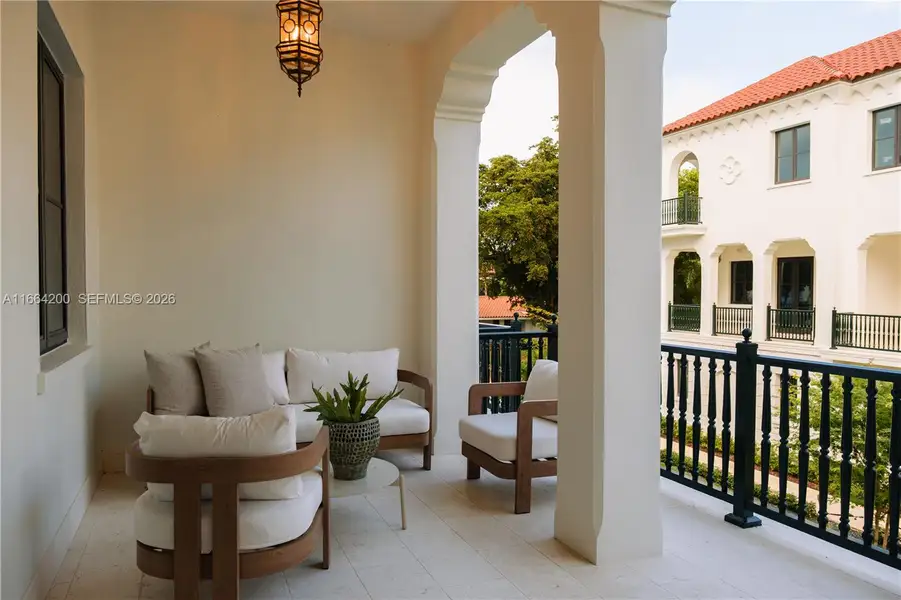 Exterior details and patio area of a home in The Village at Coral Gables, Coral Gables (Image 23).