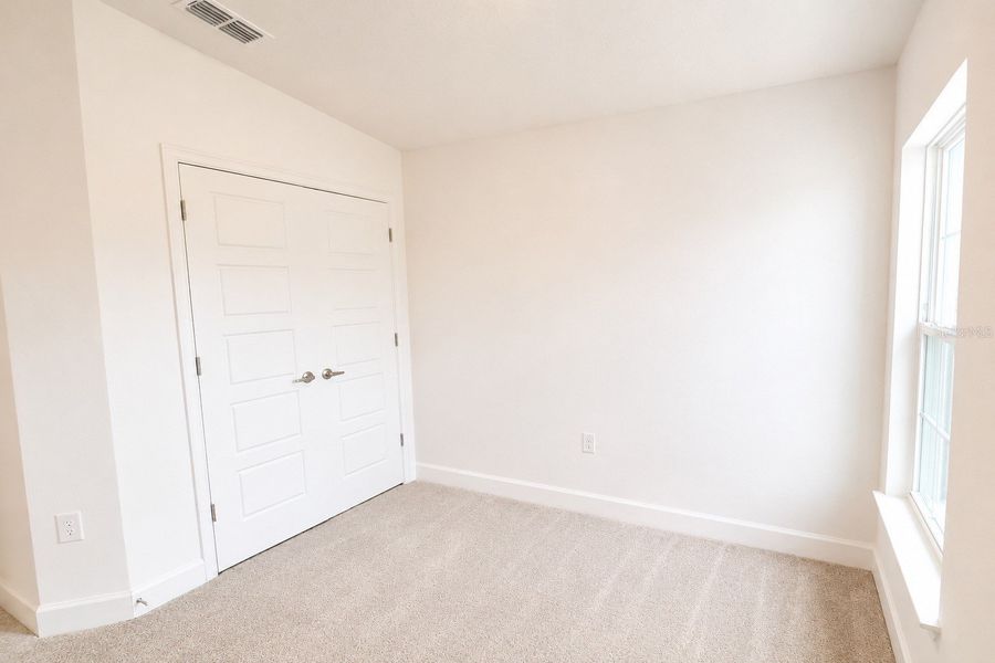 Spacious, unfurnished interior of a new home in Harmony Central, St. Cloud (Image 16).